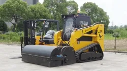 Cargadora compacta sobre orugas TS65 con accesorio